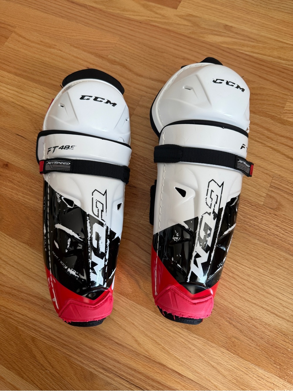 CCM White Black Red Hockey Youth Shin Guards